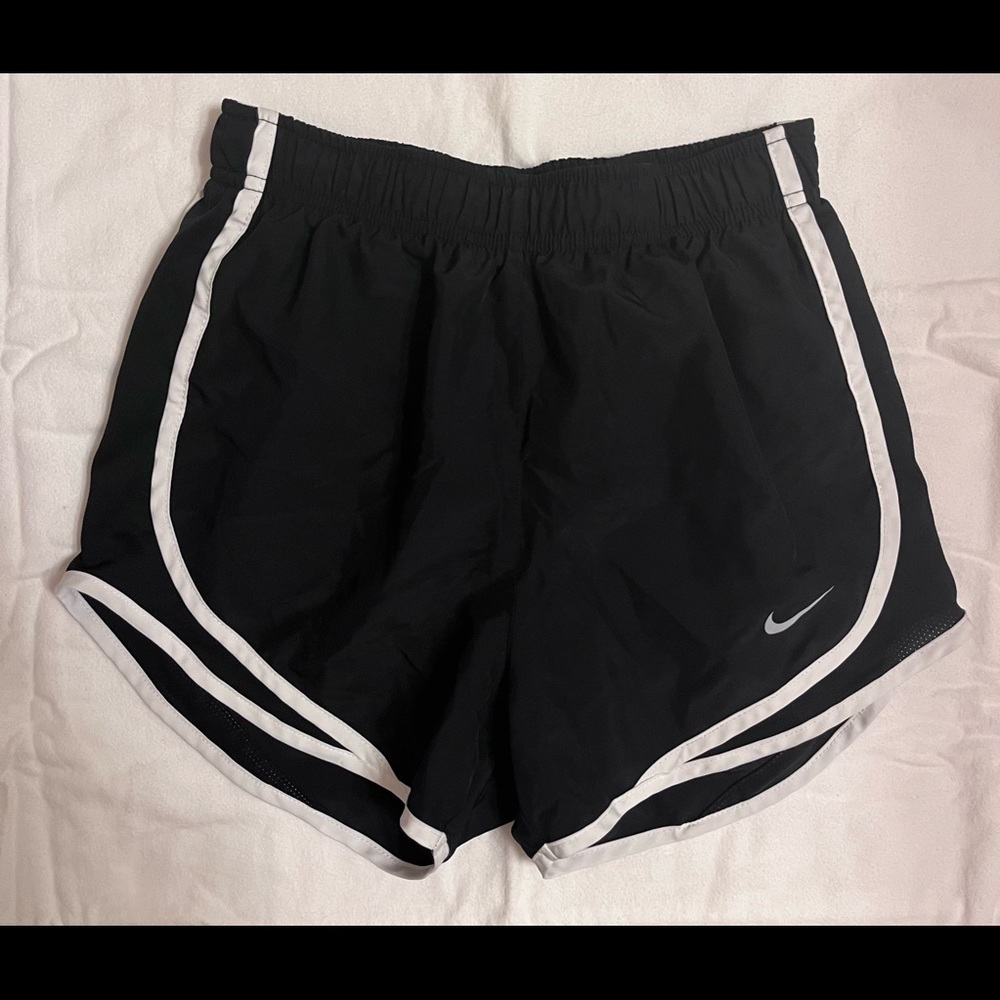 Black with white stripes - Nike women’s running shorts.